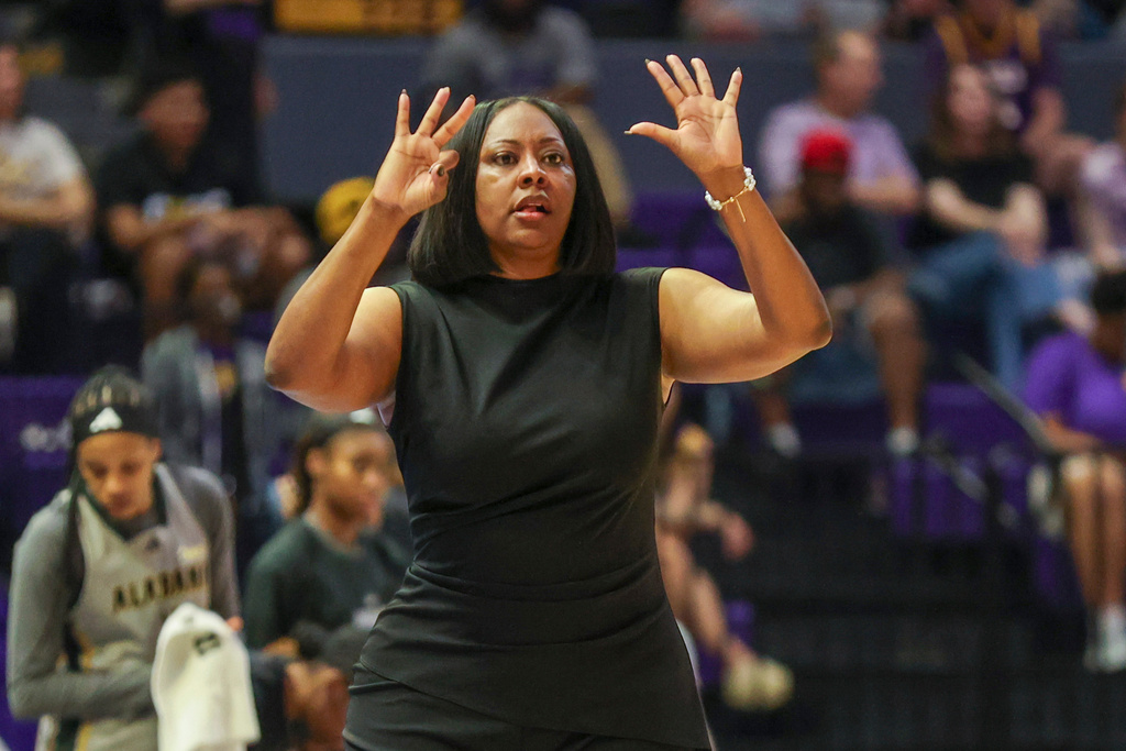 Alabama State head coach Johnetta Hayes calls to her players in the first half of an NCAA college basketball game in Baton Rouge, La., Sunday, Dec. 28, 2025. (AP Photo/Peter Forest)