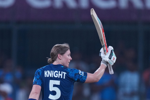 England's Heather Knight celebrates her century during the ICC Women's Cricket World Cup match between India and England in Indore, India, Sunday, Oct. 19, 2025. (AP Photo/Ajit Solanki) England's Heather Knight celebrates her century during the ICC Women's Cricket World Cup match between India and England in Indore, India, Sunday, Oct. 19, 2025. (AP Photo/Ajit Solanki)
