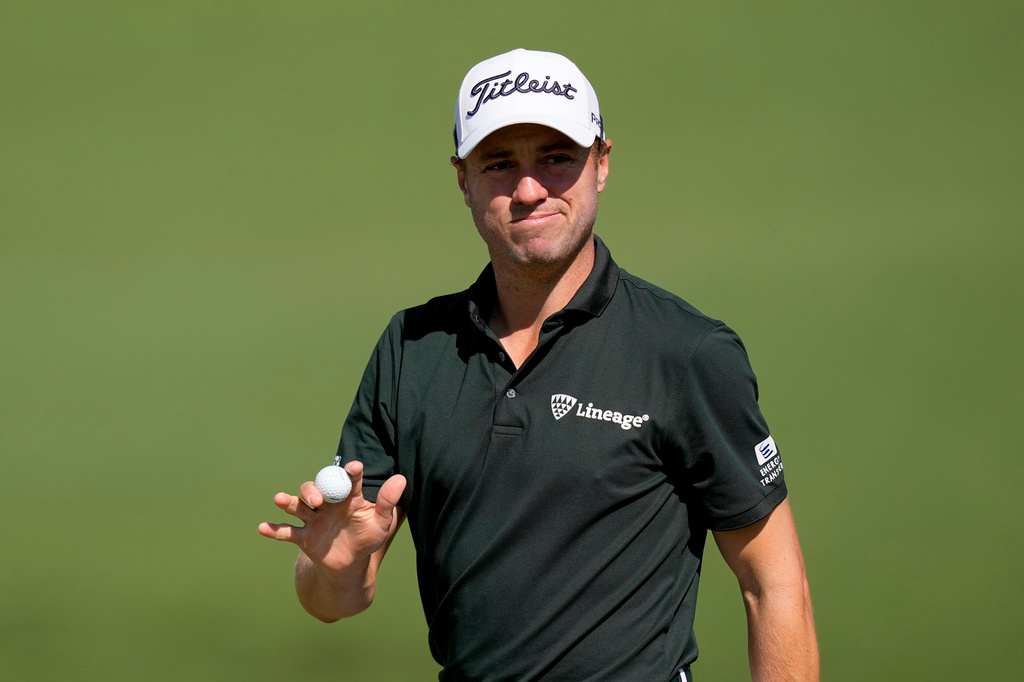 Justin Thomas waves after his putt on the second hole during the second round of the Masters golf tournament at the Augusta National Golf Club, Friday, April 10, 2026, in Augusta, Ga. (AP Photo/David J. Phillip)