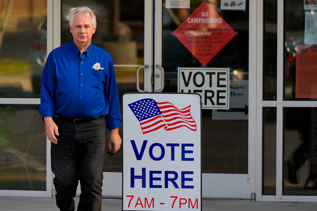 Richard Cullom leaves a voting center after voting, Tuesday, May 19, 2026, in Marietta, Ga. (AP Photo/Mike Stewart)