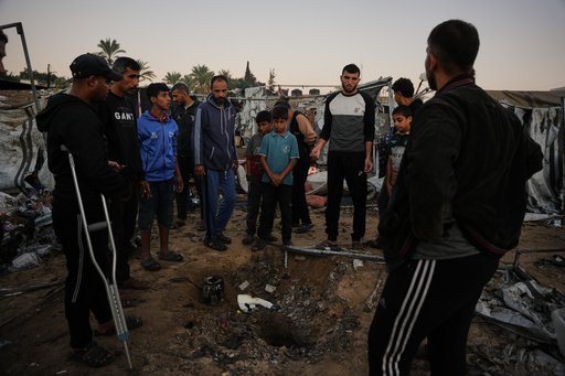 Displaced Palestinians inspect the damage after an Israeli army strike on their tent camp in Deir al-Balah, Gaza Strip, Wednesday, Oct. 29, 2025. (AP Photo/Abdel Kareem Hana) Displaced Palestinians inspect the damage after an Israeli army strike on their tent camp in Deir al-Balah, Gaza Strip, Wednesday, Oct. 29, 2025. (AP Photo/Abdel Kareem Hana)