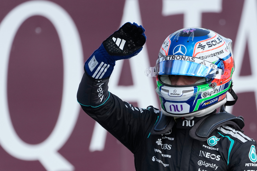 Mercedes driver Andrea Kimi Antonelli of Italy celebrates after clocked the fastest time during the qualifying session ahead of the British F1 Grand Prix, in Silverstone, England, Saturday, July 4, 2026. (AP Photo/Darko Bandic)