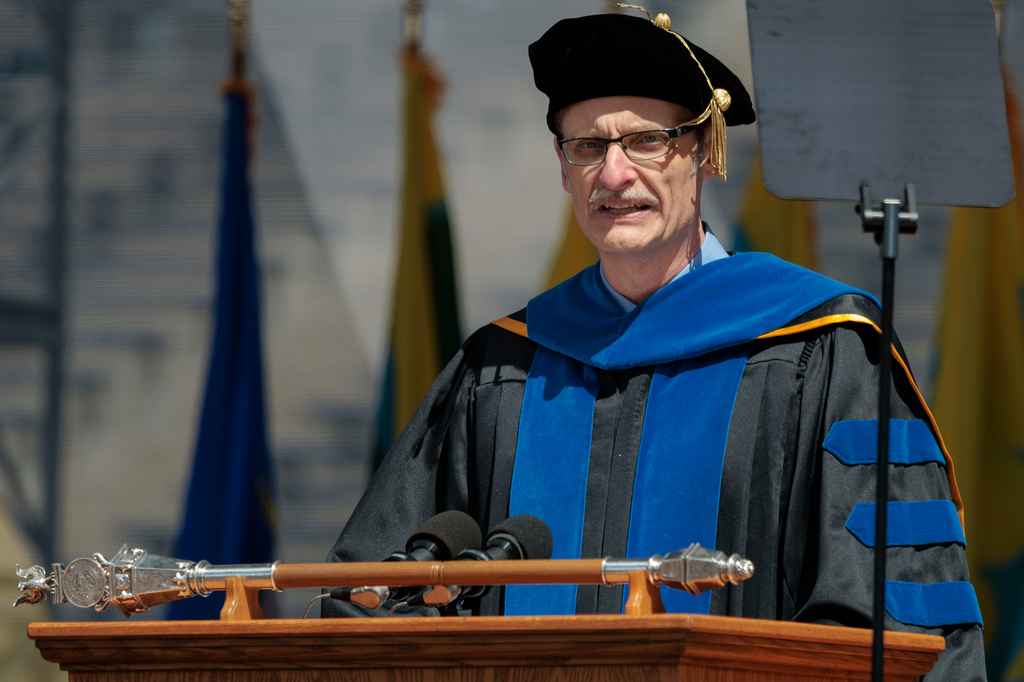 Derek Peterson, chair of the University of Michigan Faculty Senate, speaks during the University of Michigan's spring commencement ceremony at Michigan Stadium in Ann Arbor, Mich., Saturday, May 2, 2026. (Jacob Hamilton/Ann Arbor News via AP)