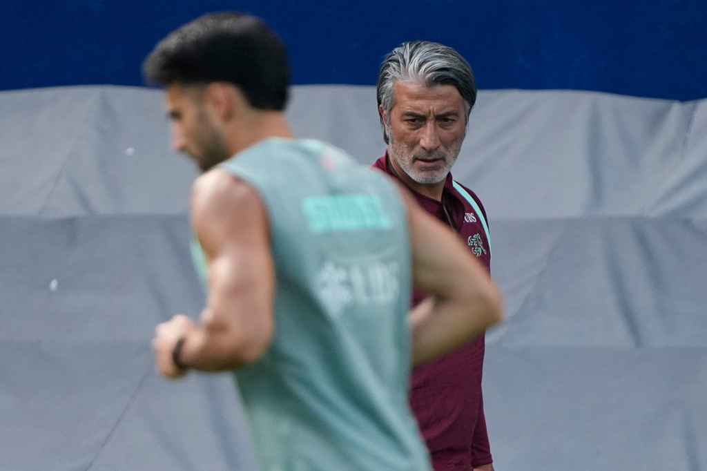 Switzerland head coach Murat Yakin watches training for the World Cup soccer tournament Thursday, July 9, 2026, in Kansas City, Kan. (AP Photo/Charlie Riedel)