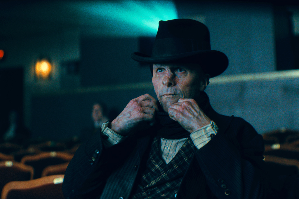 This image released by Warner Bros Entertainment shows Christian Bale in a scene from "The Bride!" (Warner Bros Entertainment via AP)