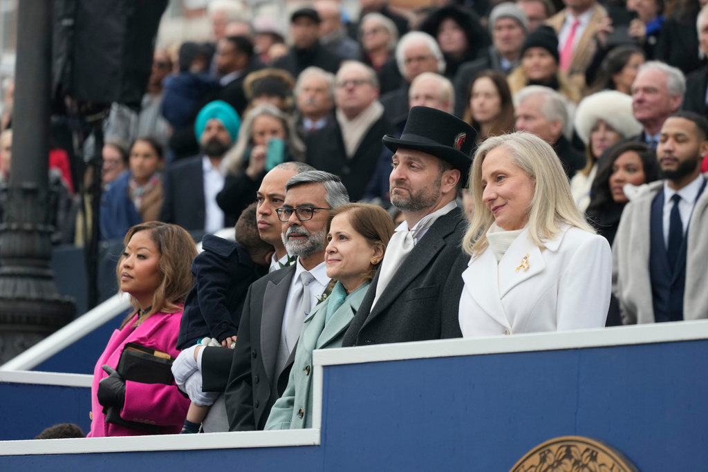 Virginia Gov. Abigail Spanberger sits with her husband Adam Spanberger during inaugural ceremonies at the Capitol in Richmond Va., Saturday Jan. 17, 2026. (AP Photo/Steve Helber, Pool)