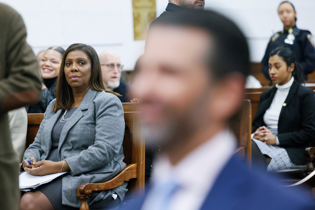 FILE - New York Attorney General Letitia James looks at Donald Trump, Jr., right, at the fraud trial for his father, former President Donald Trump, at New York Supreme Court, Nov. 2, 2023, in New York. (Michael M Santiago/Pool Photo via AP, File)