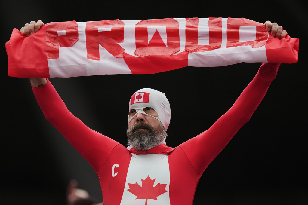 A fan of Canada waits for the start of the World Cup round of 32 soccer match between South Africa and Canada in Inglewood, Calif., near Los Angeles, Sunday, June 28, 2026. (AP Photo/Andre Penner)
