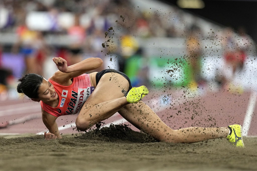 Japan's Maoko Takashima makes an attempt in the women's triple jump qualification at the World Athletics Championships in Tokyo, Tuesday, Sept. 16, 2025. (AP Photo/Matthias Schrader)