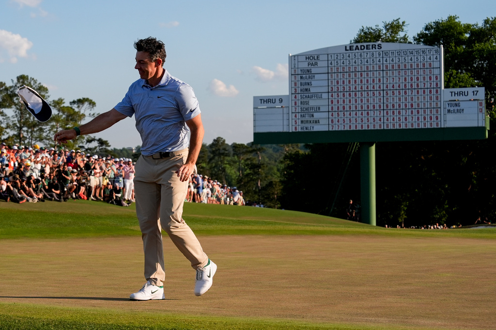 Rory McIlroy, of Northern Ireland, celebrates after winning the Masters golf tournament at the Augusta National Golf Club, Sunday, April 12, 2026, in Augusta, Ga. (AP Photo/David J. Phillip)