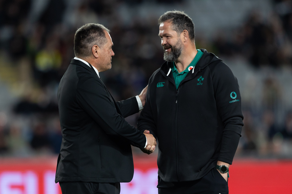 New Zealand All Blacks' head coach Dave Rennie, left, and Ireland coach Andy Farrell shake hands before their Nations Championship rugby international test match in Auckland, New Zealand, Saturday, July 18, 2026. (Brett Phibbs/Photosport via AP)