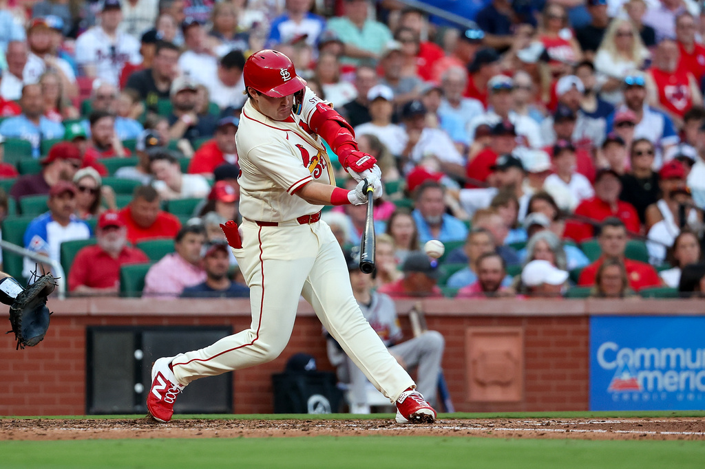 St. Louis Cardinals' Blaze Jordan hits an RBI single during the fourth inning of a baseball game against the Atlanta Braves, Saturday, July 11, 2026, in St. Louis. (AP Photo/Scott Kane)