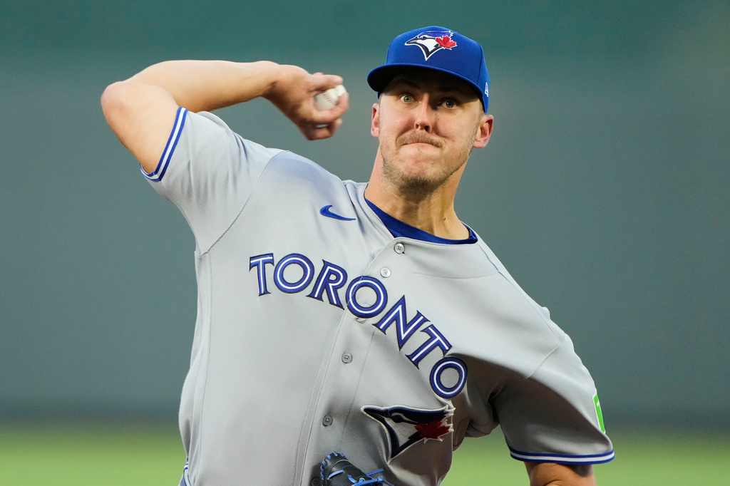 Toronto Blue Jays starting pitcher Jameson Taillon throws during the first inning of a baseball game against the Kansas City Royals, Friday, Sept. 4, 2026, in Kansas City, Mo. (AP Photo/Charlie Riedel)