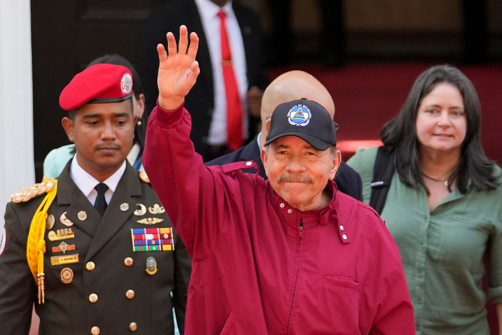 FILE - Nicaragua's President Daniel Ortega waves after attending the swearing-in ceremony of Venezuela's President Nicolas Maduro for a third term at the National Assembly in Caracas, Friday, Jan. 10, 2025. (AP Photo/Matias Delacroix, File)