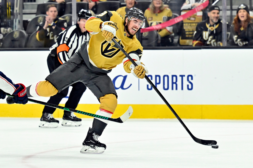 Vegas Golden Knights right wing Reilly Smith shoots against the Columbus Blue Jackets during the second period of an NHL hockey game Thursday, Jan. 8, 2026, in Las Vegas. (AP Photo/David Becker)