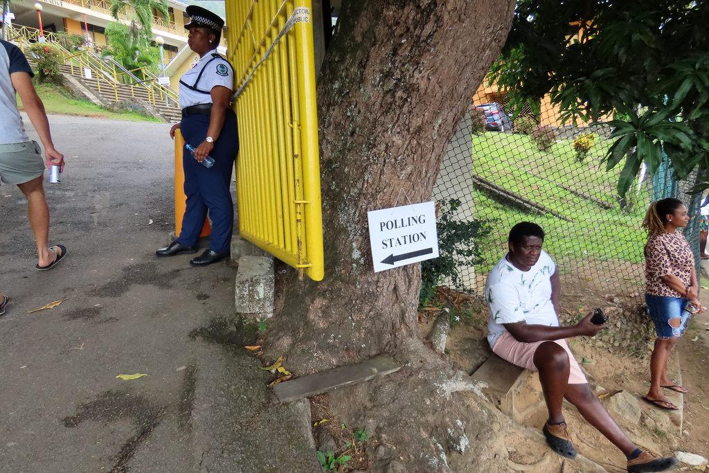 People wait to cast their votes at Bel Eau Primary School, Bel Air, Seychelles, on Saturday, Sep. 27, 2025. (AP Photo/Emilie Chetty)