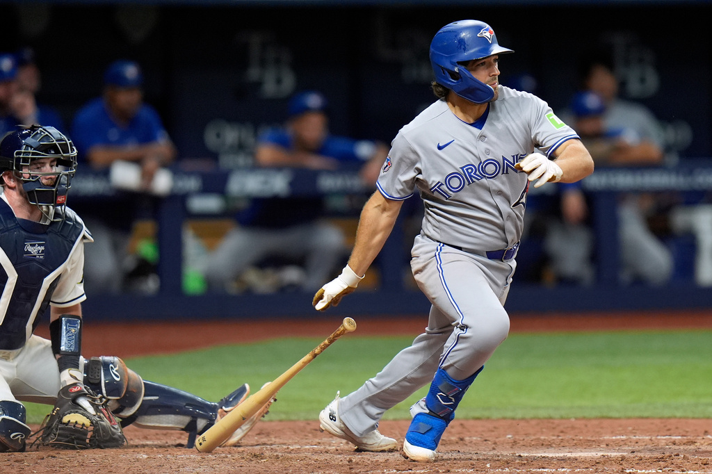 Toronto Blue Jays' Josh Smith watches his single off Tampa Bay Rays pitcher Jesse Scholtens during the ninth inning of a baseball game Tuesday, Aug. 18, 2026, in St. Petersburg, Fla. (AP Photo/Chris O'Meara)