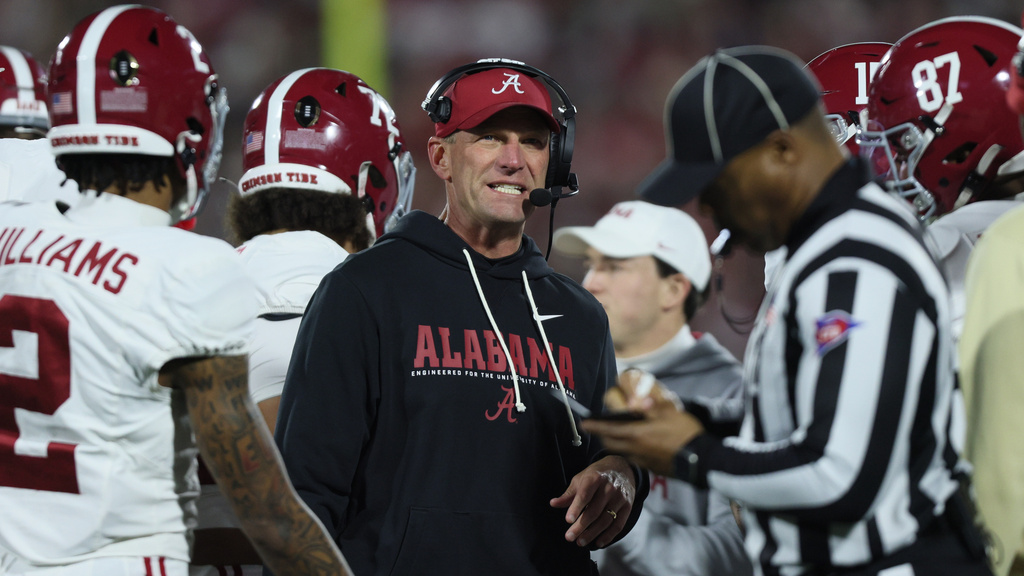Alabama head coach Kalen Deboer stands on the field during the first half in the first round of an NCAA College Football Playoff against Oklahoma, Friday, Dec. 19, 2025, in Norman, Okla. (AP Photo/Nate Billings)
