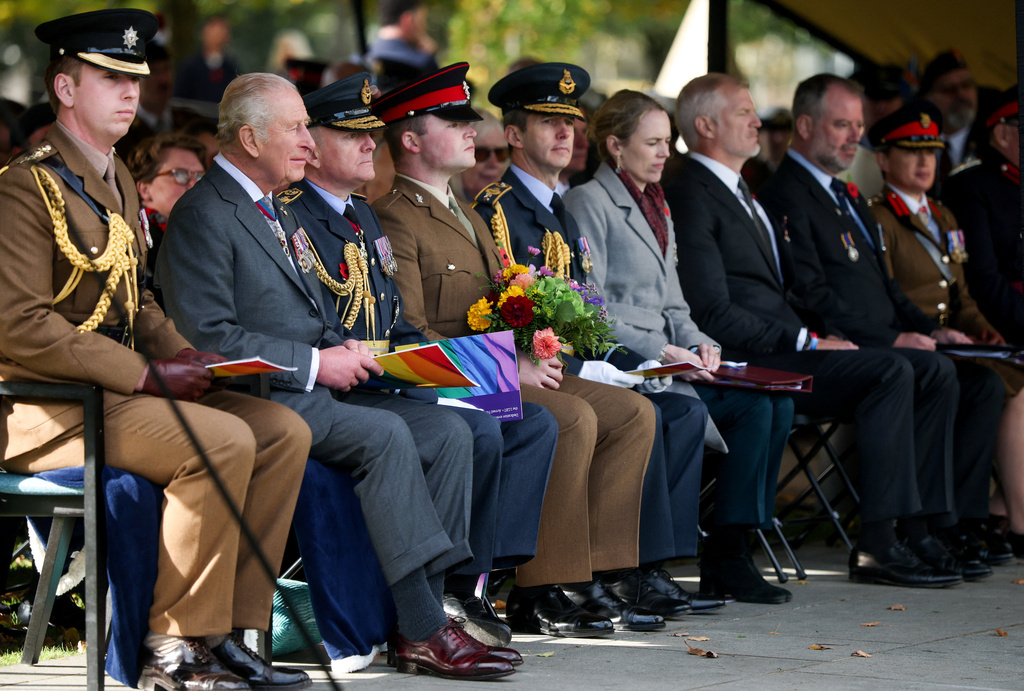 Britain's King Charles, second from left, attends the LGBT+ Armed Forces Dedication Ceremony at the National Memorial Arboretum in Alrewas, England, Monday Oct. 27, 2025. (Phil Noble/Pool via AP)