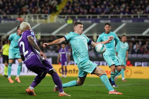 Fiorentina's Dodo, left, looks at Bologna's Lewis Ferguson touching the ball with his hand in the penalty box, during the Italian Serie A soccer match between Fiorentina and Bologna, in Florence, Italy, Sunday, Oct. 26, 2025. (Massimo Paolone/LaPresse via AP) Fiorentina's Dodo, left, looks at Bologna's Lewis Ferguson touching the ball with his hand in the penalty box, during the Italian Serie A soccer match between Fiorentina and Bologna, in Florence, Italy, Sunday, Oct. 26, 2025. (Massimo Paolone/LaPresse via AP)