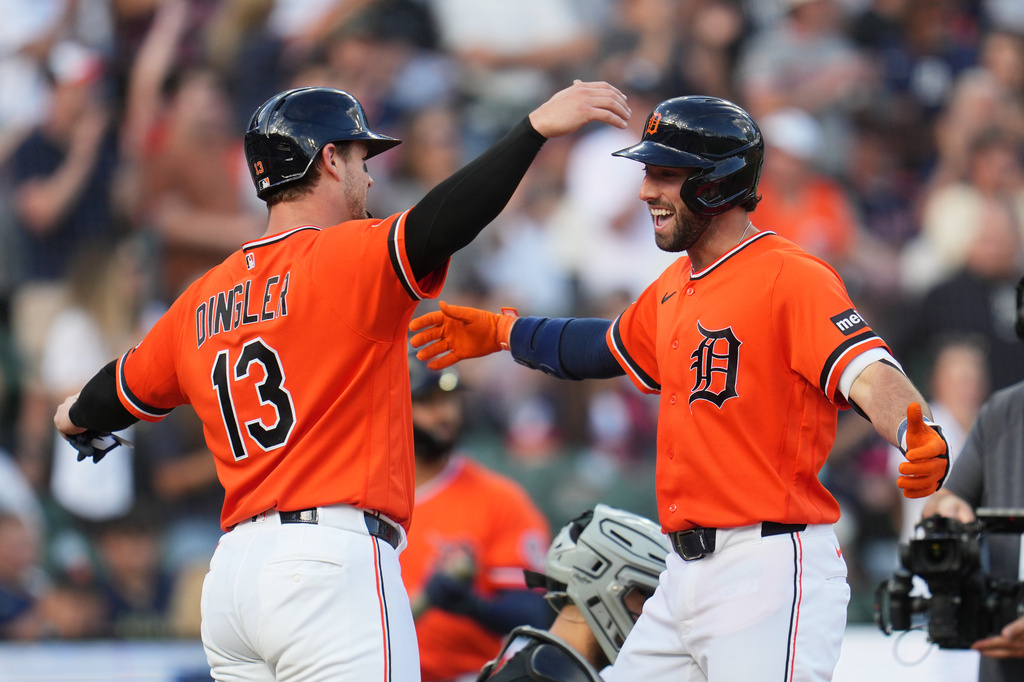 Detroit Tigers Matt Vierling, right, celebrates his two-run home run with Dillon Dingler (13) against the Chicago White Sox during the first inning of a baseball game Friday, June 19, 2026, in Detroit. (AP Photo/Paul Sancya)