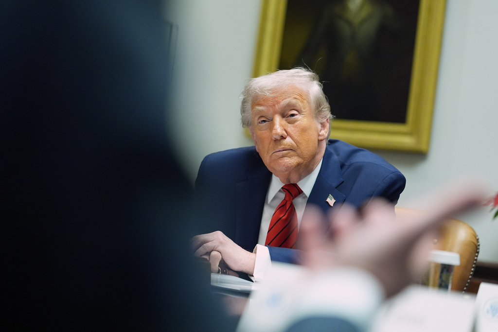 President Donald Trump listens during a roundtable discussion with business leaders in the Roosevelt Room of the White House, Wednesday, Dec. 10, 2025, in Washington. (AP Photo/Evan Vucci)