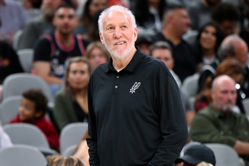 FILE - San Antonio Spurs head coach Gregg Popovich watches play during the second half of a preseason NBA basketball game against the Houston Rockets, Wednesday, Oct. 18, 2023, in San Antonio. (AP Photo/Darren Abate, File) FILE - San Antonio Spurs head coach Gregg Popovich watches play during the second half of a preseason NBA basketball game against the Houston Rockets, Wednesday, Oct. 18, 2023, in San Antonio. (AP Photo/Darren Abate, File)