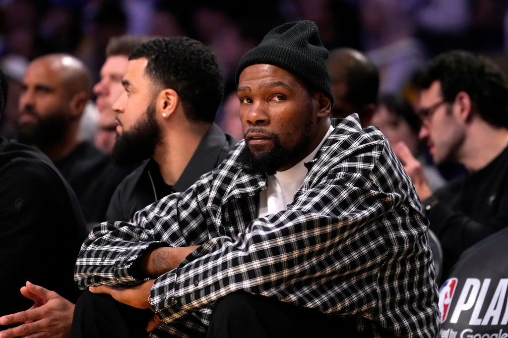 Houston Rockets' Kevin Durant watches from the bench during the first half in Game 5 of a first-round NBA playoffs basketball series against the Los Angeles Lakers, Wednesday, April 29, 2026, in Los Angeles. (AP Photo/Mark J. Terrill)