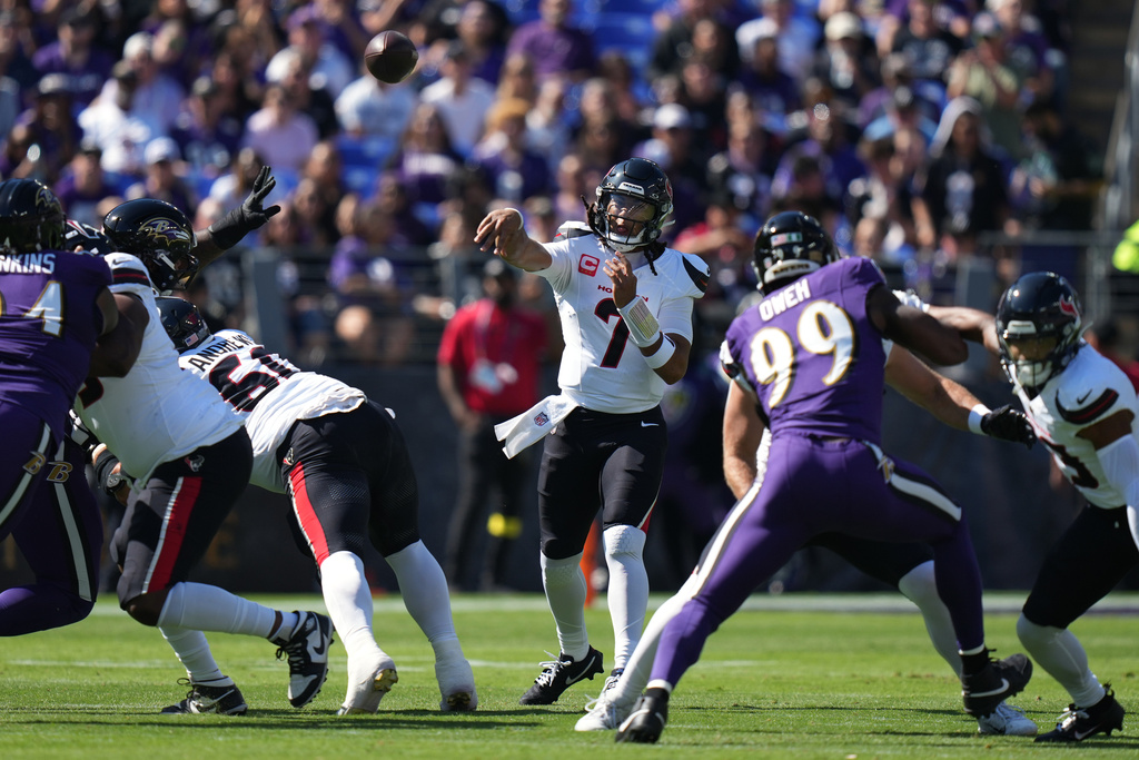 Houston Texans quarterback C.J. Stroud (7) throws during the first half of an NFL football game against the Baltimore Ravens, Sunday, Oct. 5, 2025, in Baltimore. (AP Photo/Stephanie Scarbrough)