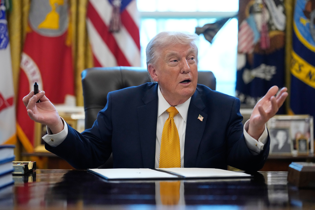 President Donald Trump speaks before signing an executive order regarding a task force on fraud in the Oval Office of the White House, Monday, March 16, 2026, in Washington. (AP Photo/Julia Demaree Nikhinson)