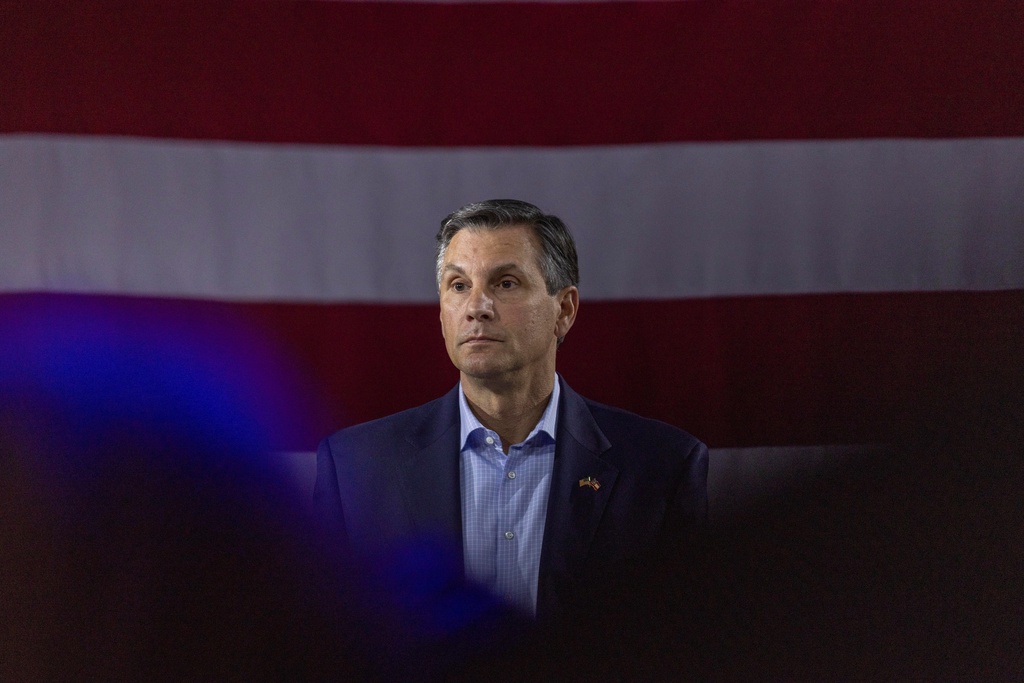 Derek Dooley, a Republican candidate for Senate in Georgia, listens to questions during an Atlanta Young Republicans campaign event Thursday, Feb. 12, 2026, in Atlanta. (AP Photo/Alyssa Pointer)