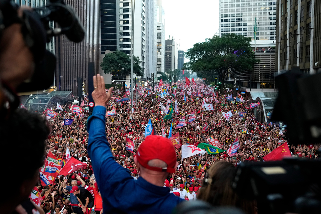 Brazilian President Luiz Inacio Lula da Silva, who is running for reelection, waves to supporters in the end his final campaign rally a day ahead of the presidential runoff election in Sao Paulo, Brazil, Saturday, Oct. 24, 2026. (AP Photo/Natacha Pisarenko)