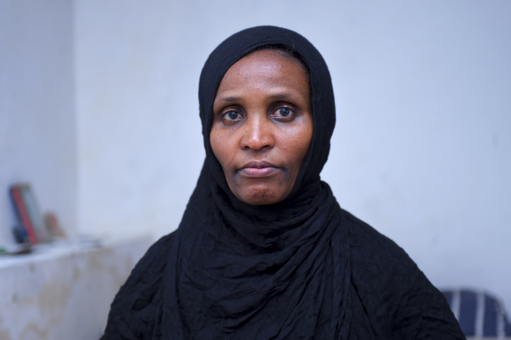 Senait Tadesse, who her 27-year-old daughter made it to Yemen, only to be held captive by kidnappers, poses for a photo at her home in Addis Ababa, Ethiopia Sunday, Aug. 17, 2025. (AP Photo)