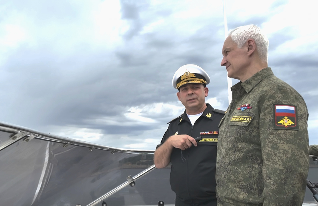 In this photo taken from video released by Russian Defense Ministry Press Service on Saturday, Aug. 9, 2025, Russian Defense Minister Andrei Belousov, right, inspects the base of the Baltic Fleet in Russia's Baltic exclave of Kaliningrad, Russia. (Russian Defense Ministry Press Service photo via AP)