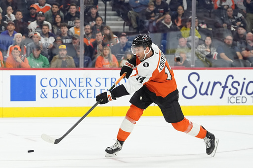 Philadelphia Flyers' Sean Couturier scores against Florida Panthers goaltender Daniil Tarasov during the second period of an NHL hockey game, Monday, Oct. 13, 2025, in Philadelphia. (AP Photo/Matt Rourke) Philadelphia Flyers' Sean Couturier scores against Florida Panthers goaltender Daniil Tarasov during the second period of an NHL hockey game, Monday, Oct. 13, 2025, in Philadelphia. (AP Photo/Matt Rourke)