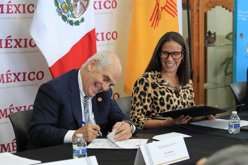 Santa Fe Mayor Alan Webber and Patricia Pinzon, Consul of Mexico in Albuquerque, sign documents returning a centuries-old map to Mexico's national archives during a ceremony in Albuquerque, New Mexico, on Tuesday, Sept. 23, 2025. (AP Photo/Susan Montoya Bryan) Santa Fe Mayor Alan Webber and Patricia Pinzon, Consul of Mexico in Albuquerque, sign documents returning a centuries-old map to Mexico's national archives during a ceremony in Albuquerque, New Mexico, on Tuesday, Sept. 23, 2025. (AP Photo/Susan Montoya Bryan)
