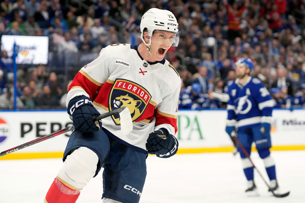 Florida Panthers center Anton Lundell celebrates his goal against the Tampa Bay Lightning during the first period of an NHL hockey game Monday, Dec. 15, 2025, in Tampa, Fla. (AP Photo/Chris O'Meara)