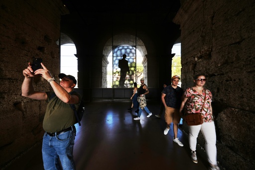 People visit the ancient Roman Colosseum, in Rome, Friday, Oct. 24, 2025. (AP Photo/Andrew Medichini) People visit the ancient Roman Colosseum, in Rome, Friday, Oct. 24, 2025. (AP Photo/Andrew Medichini)