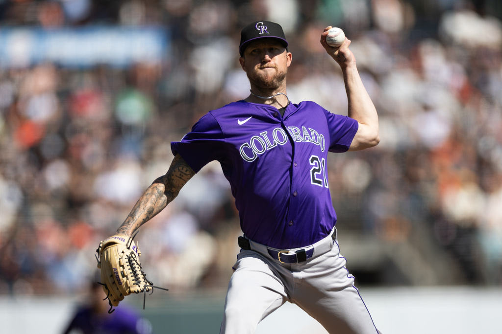Colorado Rockies pitcher Kyle Freeland throws during the first inning of an MLB baseball game against the San Francisco Giants, Saturday, Sept. 27, 2025, in San Francisco. (AP Photo/Benjamin Fanjoy)