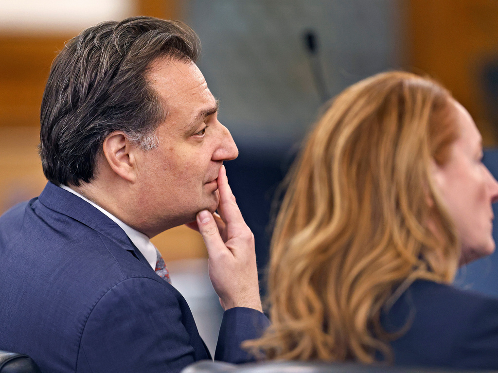 Brian Walshe looks at the jury while seated with his attorney Kelli Porges in Norfolk Superior Court on Monday, Dec. 15, 2025 in Dedham, Mass. (Greg Derr/The Patriot Ledger via AP, Pool)