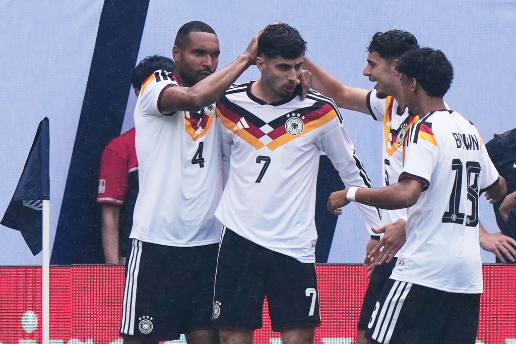 Germany forward Kai Havertz (7) celebrates with teammates after scoring a goal during the first half of an international friendly soccer match against United States in Chicago, Saturday, June 6, 2026. (AP Photo/Nam Y. Huh)