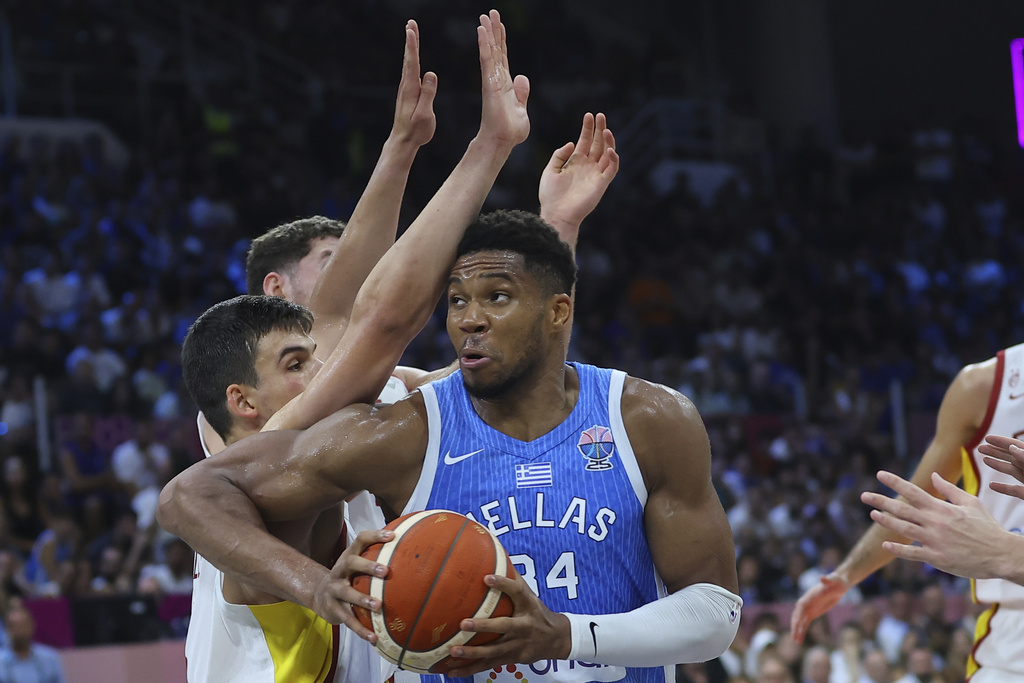 Greece's Giannis Antetokounmpo drives the ball during the Eurobasket, European Basketball Championship Group C match between Spain and Greece at Spyros Kyprianou Arena, in Limassol, Cyprus, Thursday, Sept. 4, 2025. (AP Photo/Sakis Savvides)