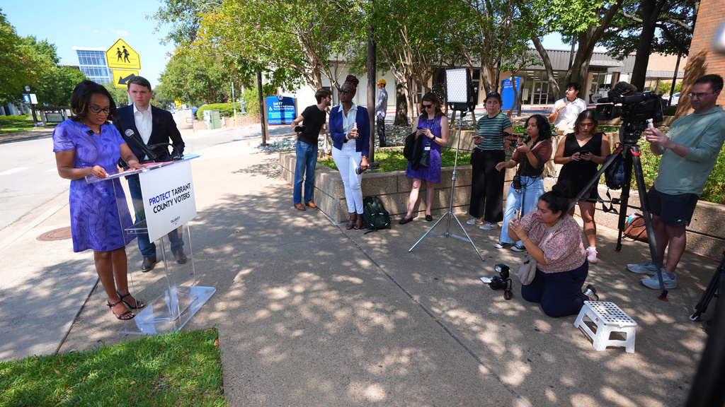 Tarrant County Commissioner Alisa Simmons, left, speaks as Democratic Senate candidate James Talarico looks on as during a news conference at UTA, Sunday, Aug. 30, 2026, in Arlington, Texas. (AP Photo/LM Otero)