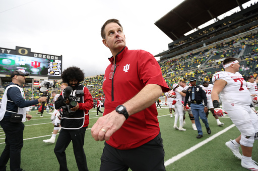 Indiana head coach Curt Cignetti, center, walks on the field after a win over Oregon in an NCAA college football game, Saturday, Oct. 11, 2025, in Eugene, Ore. (AP Photo/Lydia Ely) Indiana head coach Curt Cignetti, center, walks on the field after a win over Oregon in an NCAA college football game, Saturday, Oct. 11, 2025, in Eugene, Ore. (AP Photo/Lydia Ely)
