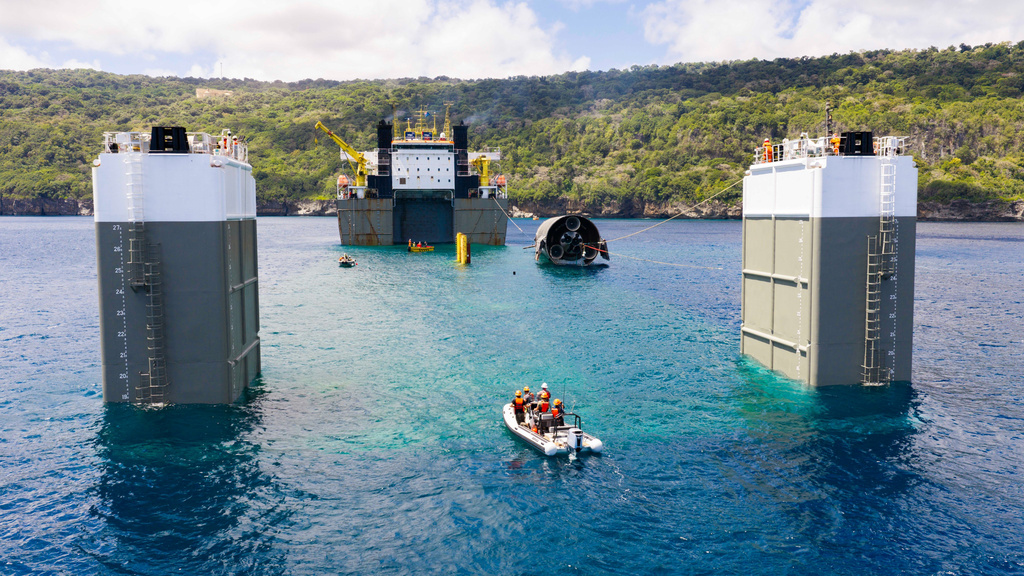 This image provided by SpaceX on Aug. 27, 2026, shows Starship loaded onto a semisubmersible ship to begin the several-month journey back to Starbase. (SpaceX via AP)