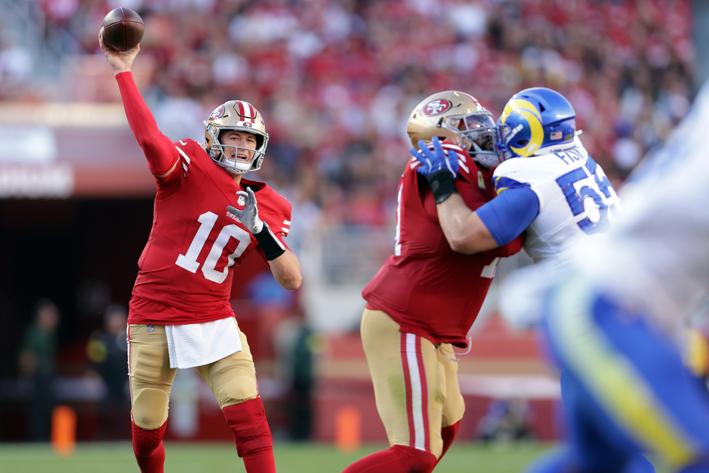 San Francisco 49ers' Mac Jones looks to pass the ball in the second quarter of an NFL football game against the Los Angeles Rams in Santa Clara, Calif., Sunday, Nov. 9, 2025. (Scott Strazzante/San Francisco Chronicle via AP)/San Francisco Chronicle via AP)