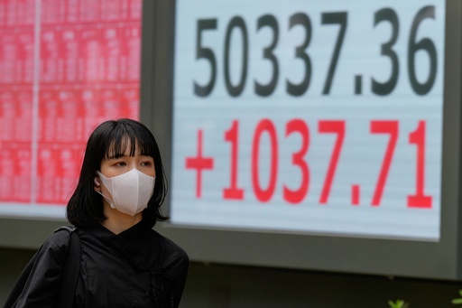 A person walks in front of an electronic stock board showing Japan's Nikkei index at a securities firm Monday, Oct. 27, 2025, in Tokyo. (AP Photo/Eugene Hoshiko) A person walks in front of an electronic stock board showing Japan's Nikkei index at a securities firm Monday, Oct. 27, 2025, in Tokyo. (AP Photo/Eugene Hoshiko)
