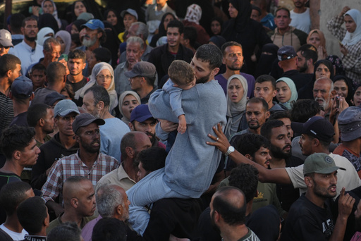 A freed Palestinian prisoner, center, hugs a child as he is greeted upon arriving in the Gaza Strip after being released from Israeli jails under a ceasefire agreement between Hamas and Israel, in Khan Younis, southern Gaza Strip, Monday, Oct. 13, 2025. (AP Photo/Jehad Alshrafi) A freed Palestinian prisoner, center, hugs a child as he is greeted upon arriving in the Gaza Strip after being released from Israeli jails under a ceasefire agreement between Hamas and Israel, in Khan Younis, southern Gaza Strip, Monday, Oct. 13, 2025. (AP Photo/Jehad Alshrafi)