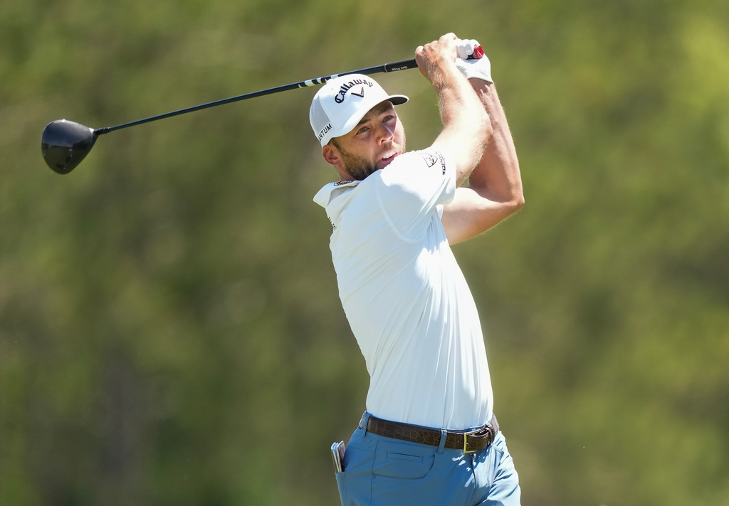 Sam Burns tees off on the second hole during the third round at the Canadian Open golf tournament in Caledon, Ontario, Saturday, June 13, 2026. (Nathan Denette/The Canadian Press via AP)