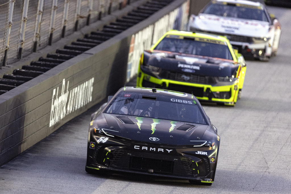 Ty Gibbs (54) leads AJ Allmendinger (16), and Austin Cindric (2) during a NASCAR Cup Series auto race, Saturday, Sept. 13, 2025, in Bristol, Tenn. (AP Photo/Wade Payne)